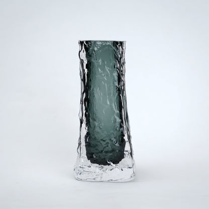 Transparent grey column glass vase with a tall vertical shape and smooth finish, designed for modern home decor and floral arrangements.