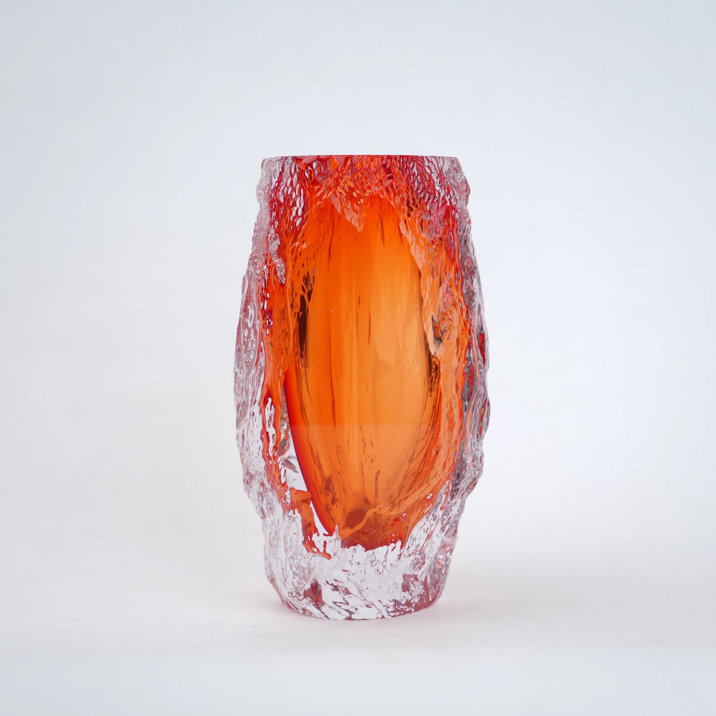 Glass vase with red and orange gradient on a white background