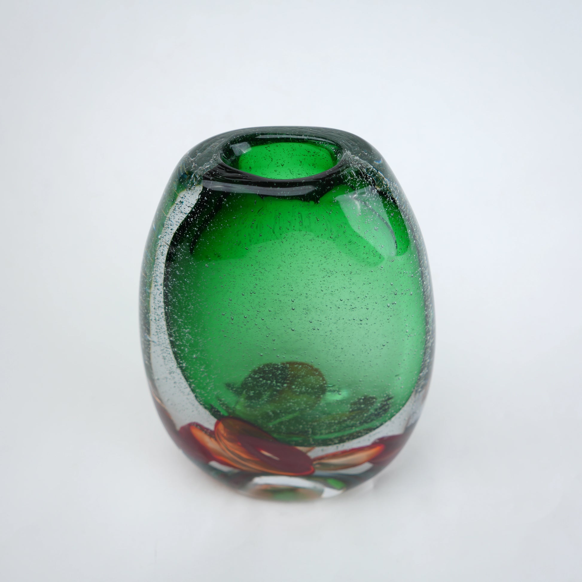 Green clear glass vase with decorative bubble base