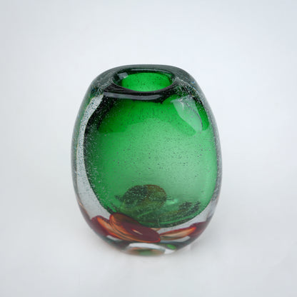 Green clear glass vase with decorative bubble base