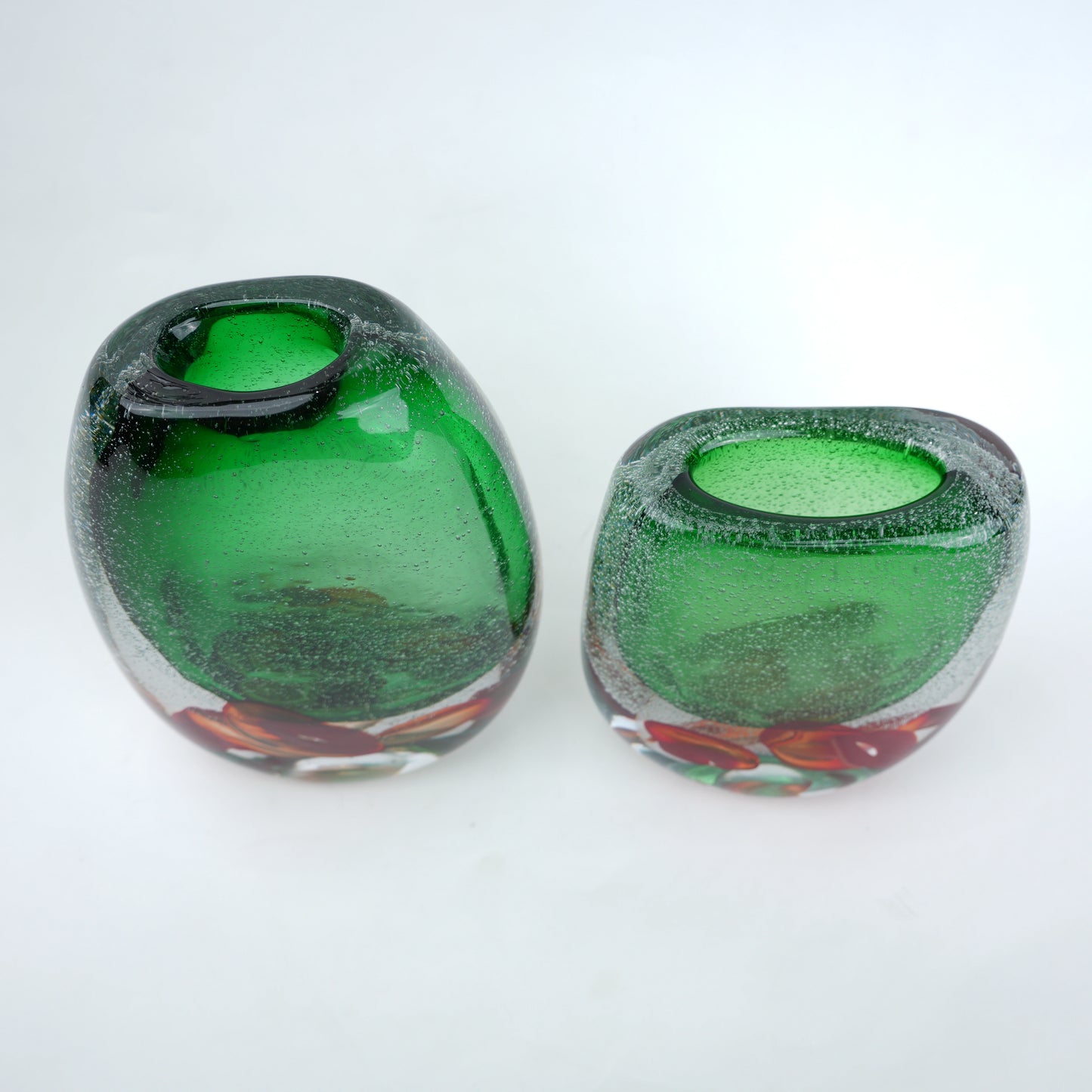 Green glass vase pair, top-down scale shot