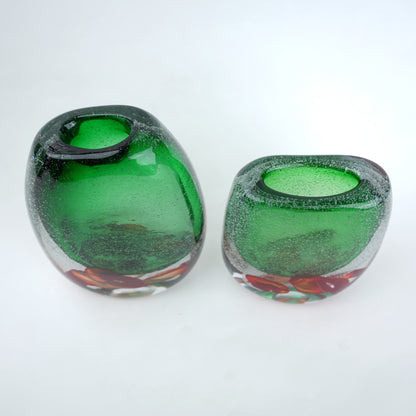 Green glass vase pair, top-down scale shot