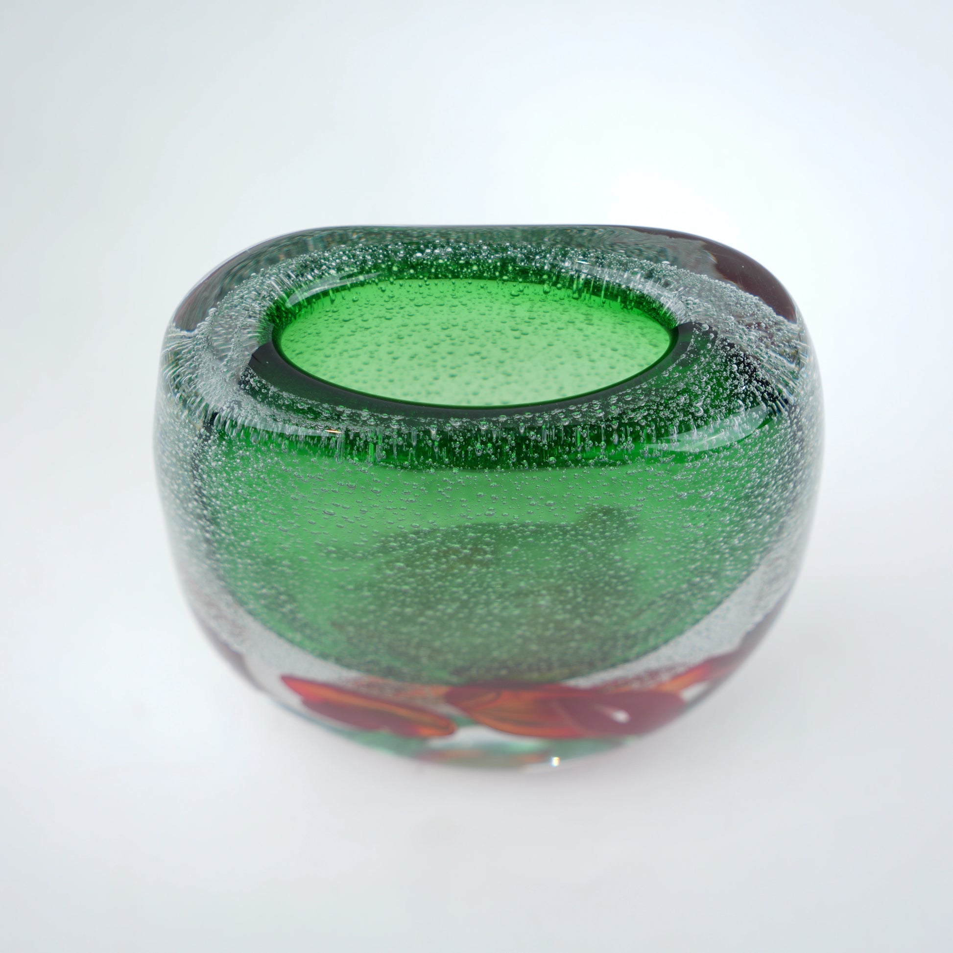 Green glass vase, top-down close-up detail