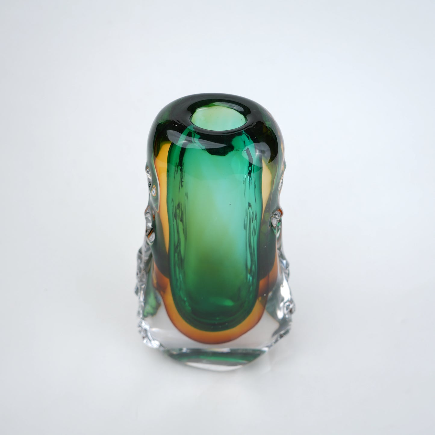 Oval core green gold glass vase with layered glass design