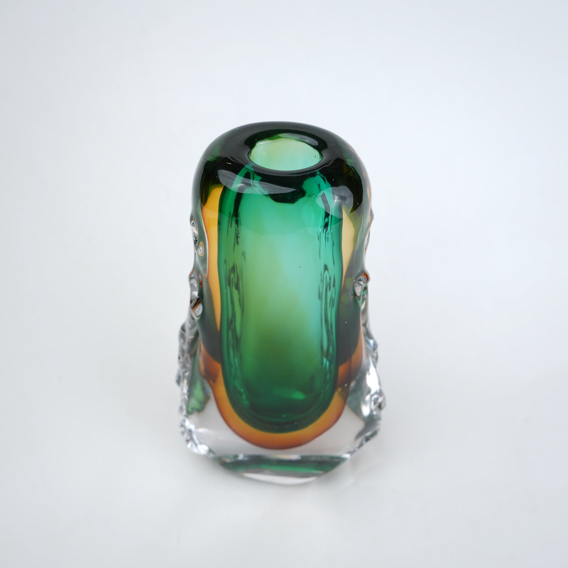 Oval core green gold glass vase with layered glass design