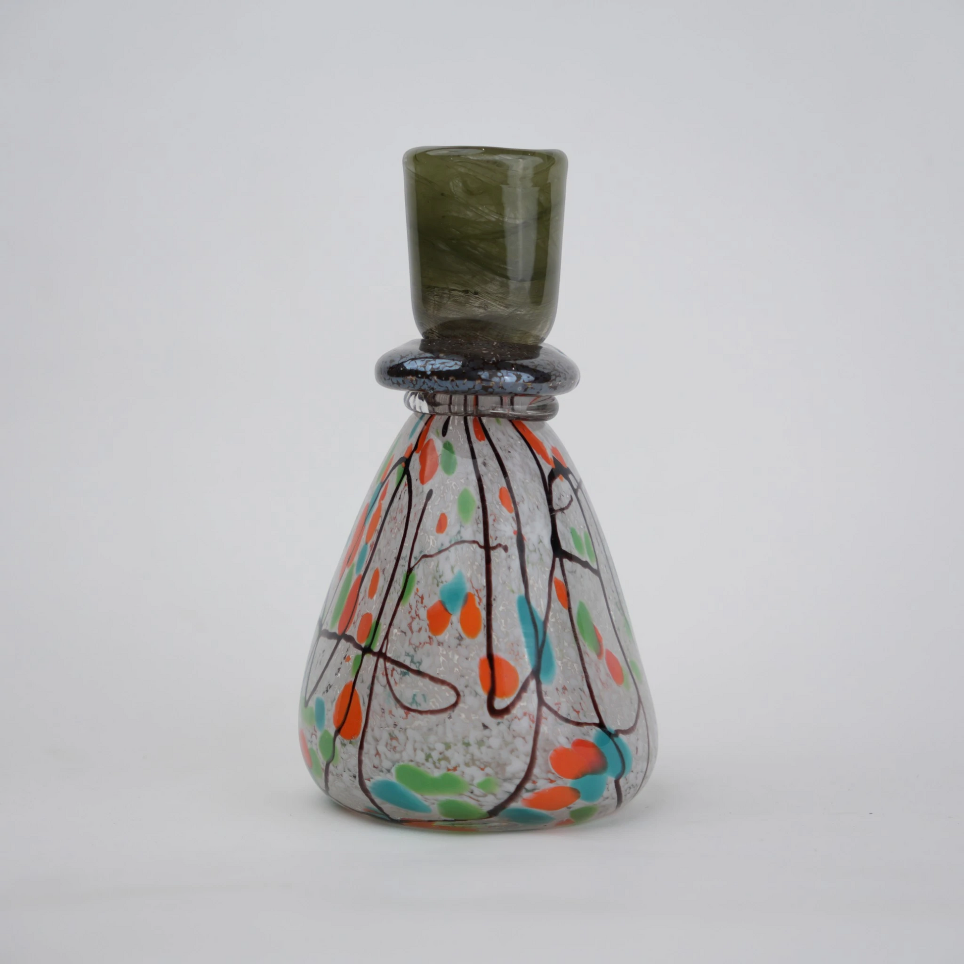 multicolor abstract glass candle holder with orange green accents and black drip design