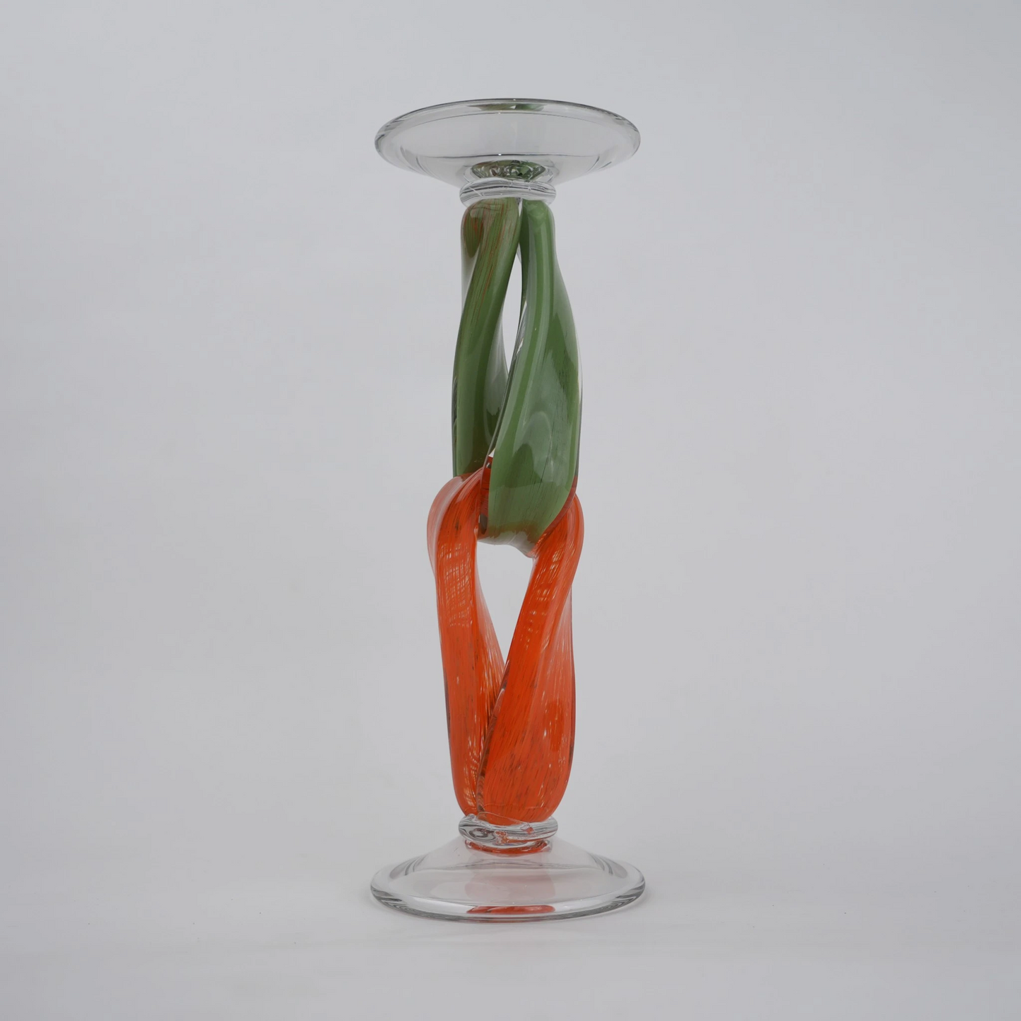 Modern art glass candle holder with green body and orange accent frame