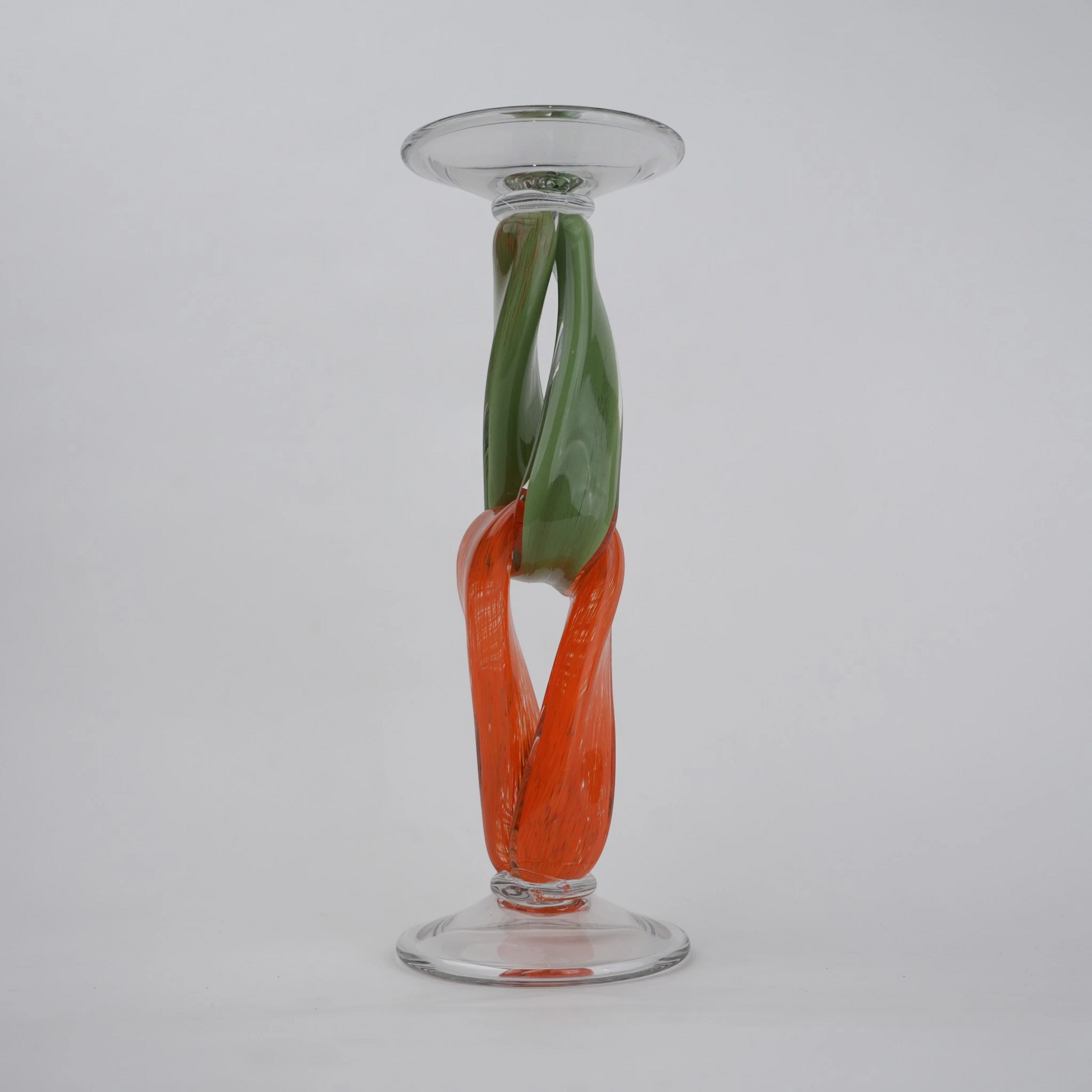 Modern art glass candle holder with green body and orange accent frame