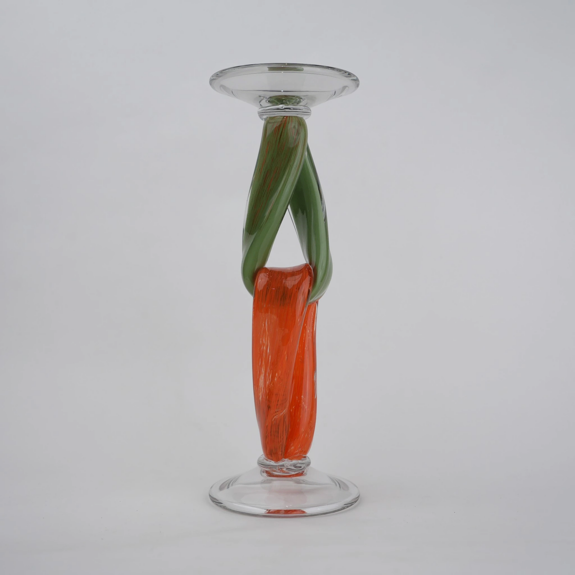Modern art glass candle holder with green body and orange accent frame