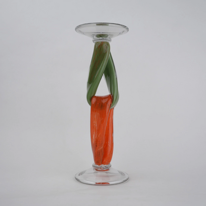 Modern art glass candle holder with green body and orange accent frame