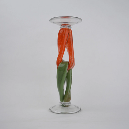 Modern art glass candle holder with green body and orange accent frame