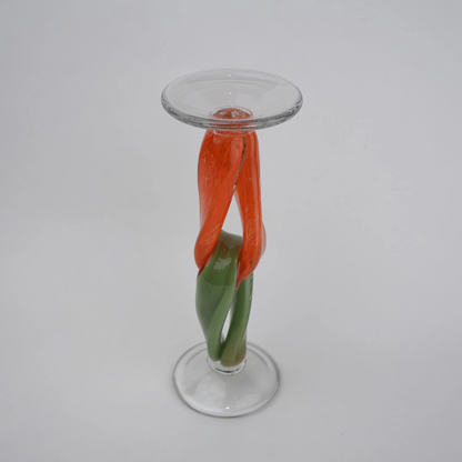 Modern art glass candle holder with green body and orange accent frame