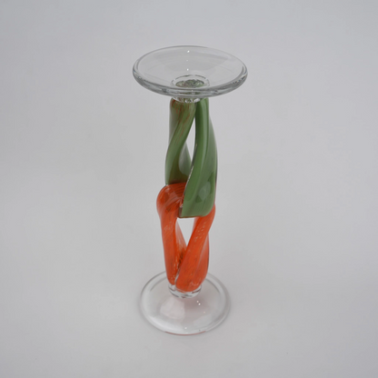 Modern art glass candle holder with green body and orange accent frame