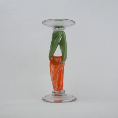 Modern art glass candle holder with green body and orange accent frame