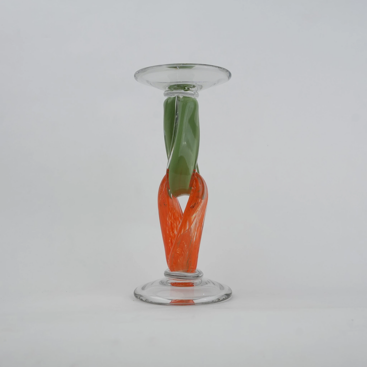 Modern art glass candle holder with green body and orange accent frame