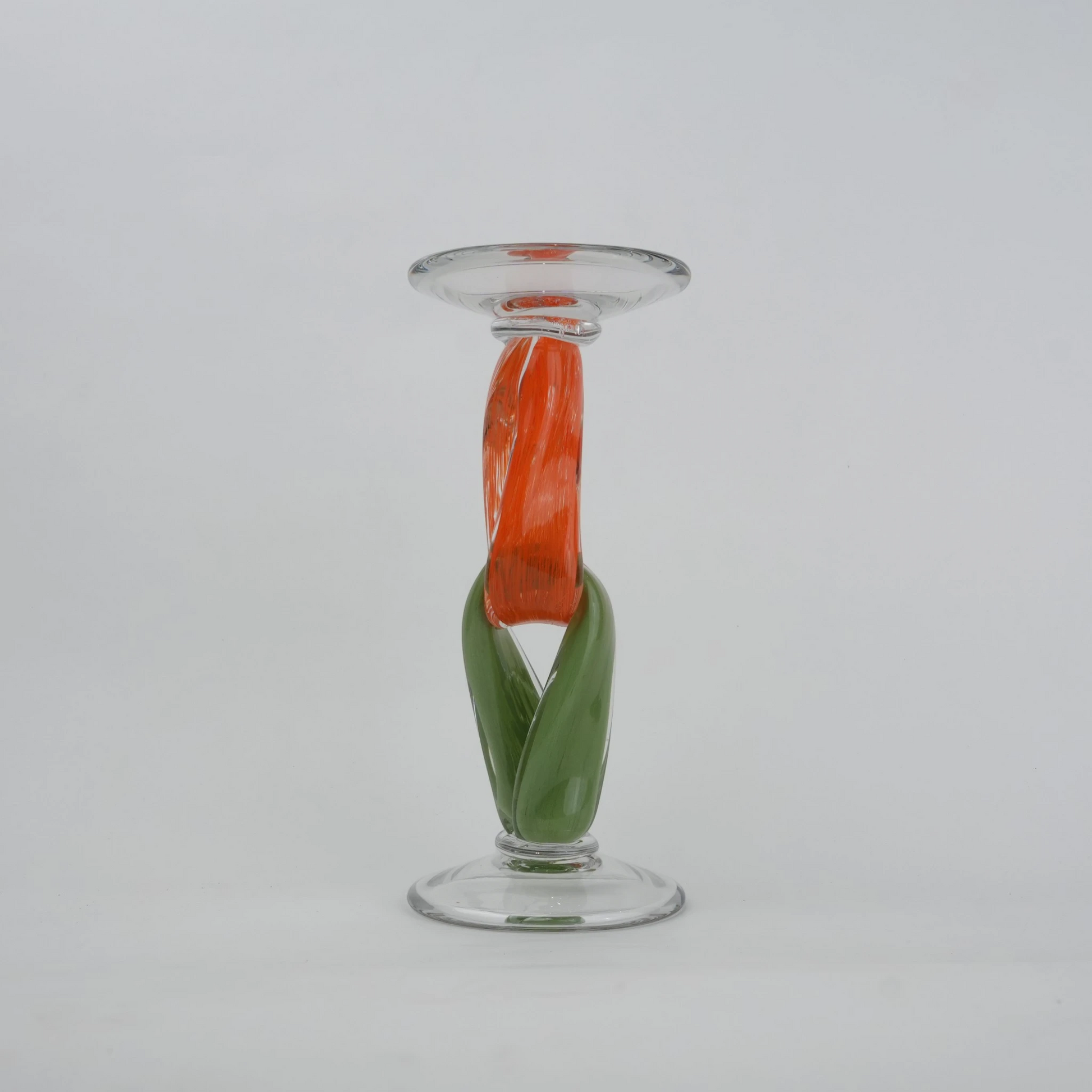 Modern art glass candle holder with green body and orange accent frame