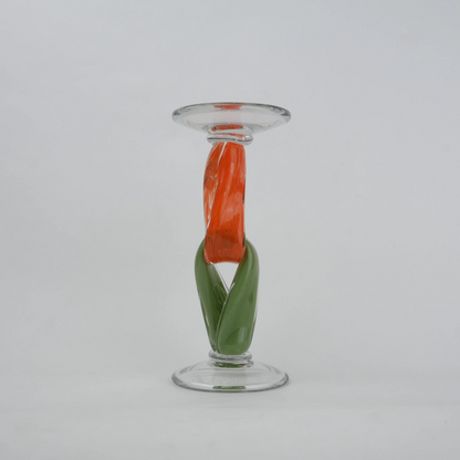 Modern art glass candle holder with green body and orange accent frame