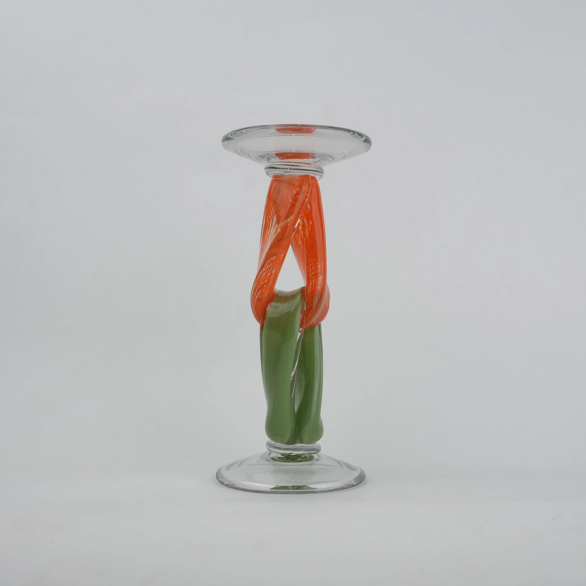 Modern art glass candle holder with green body and orange accent frame