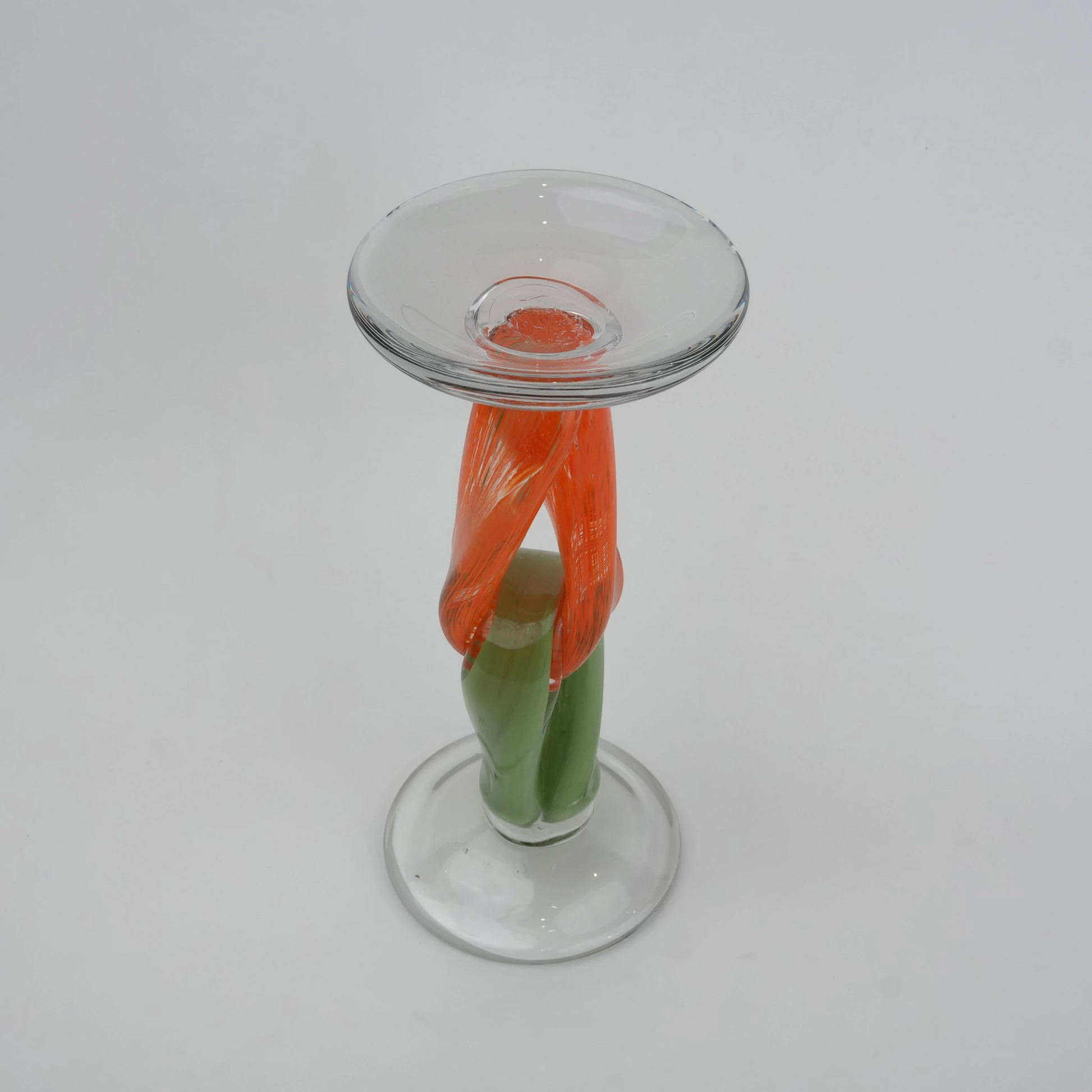 Modern art glass candle holder with green body and orange accent frame