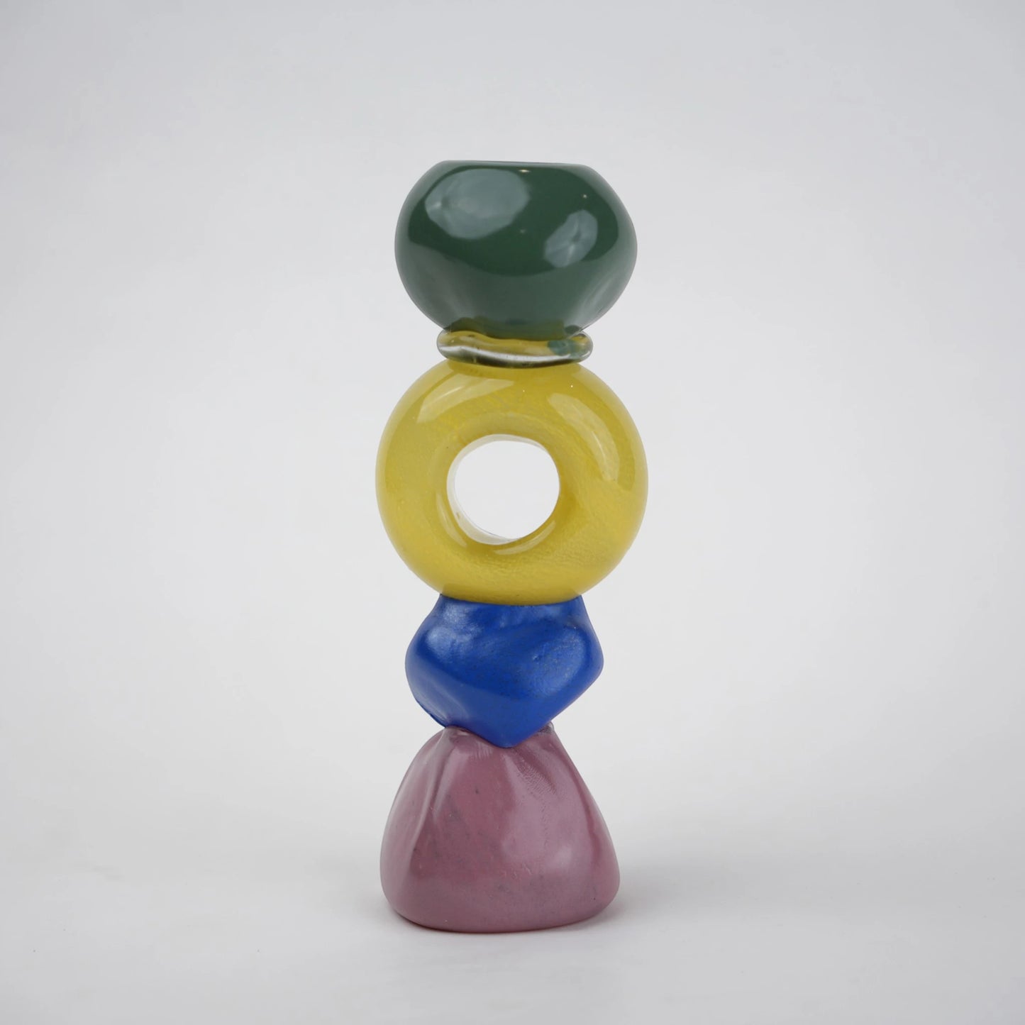 Colorful totem glass candle holder with stacked geometric design and circular ring center