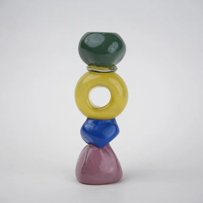 Colorful totem glass candle holder with stacked geometric design and circular ring center