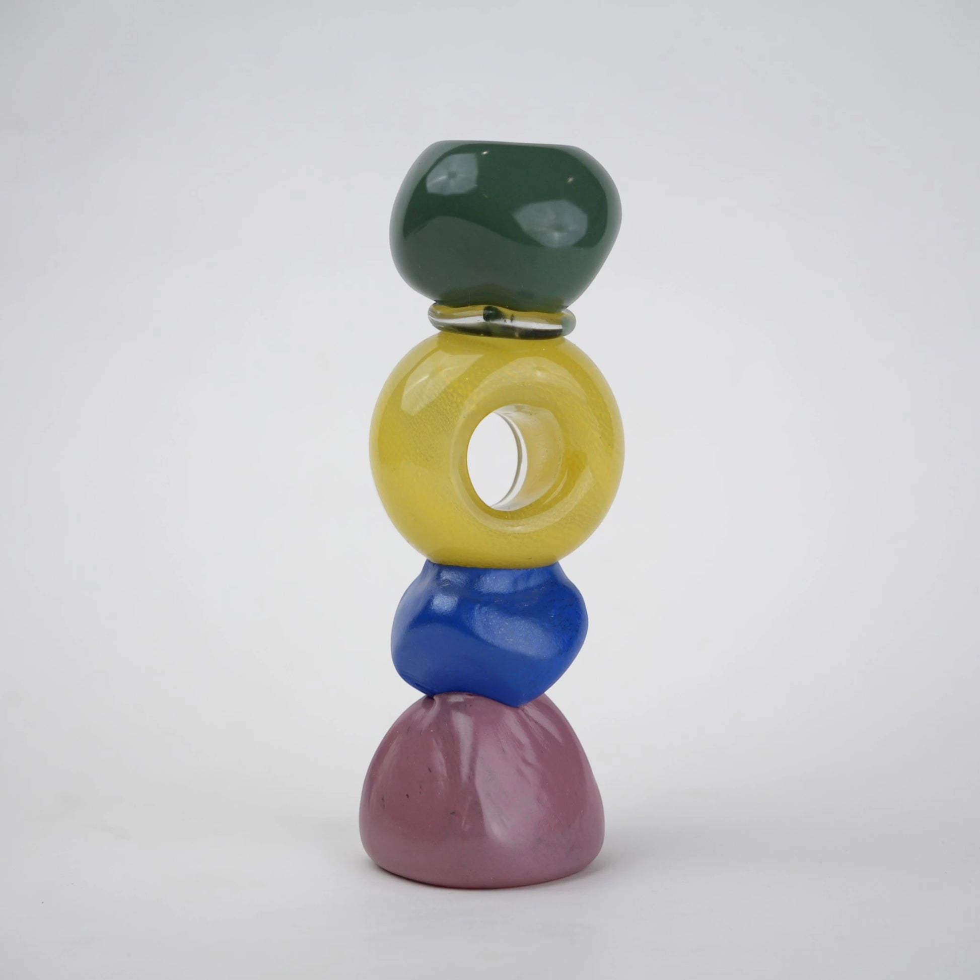 Colorful totem glass candle holder with stacked geometric design and circular ring center