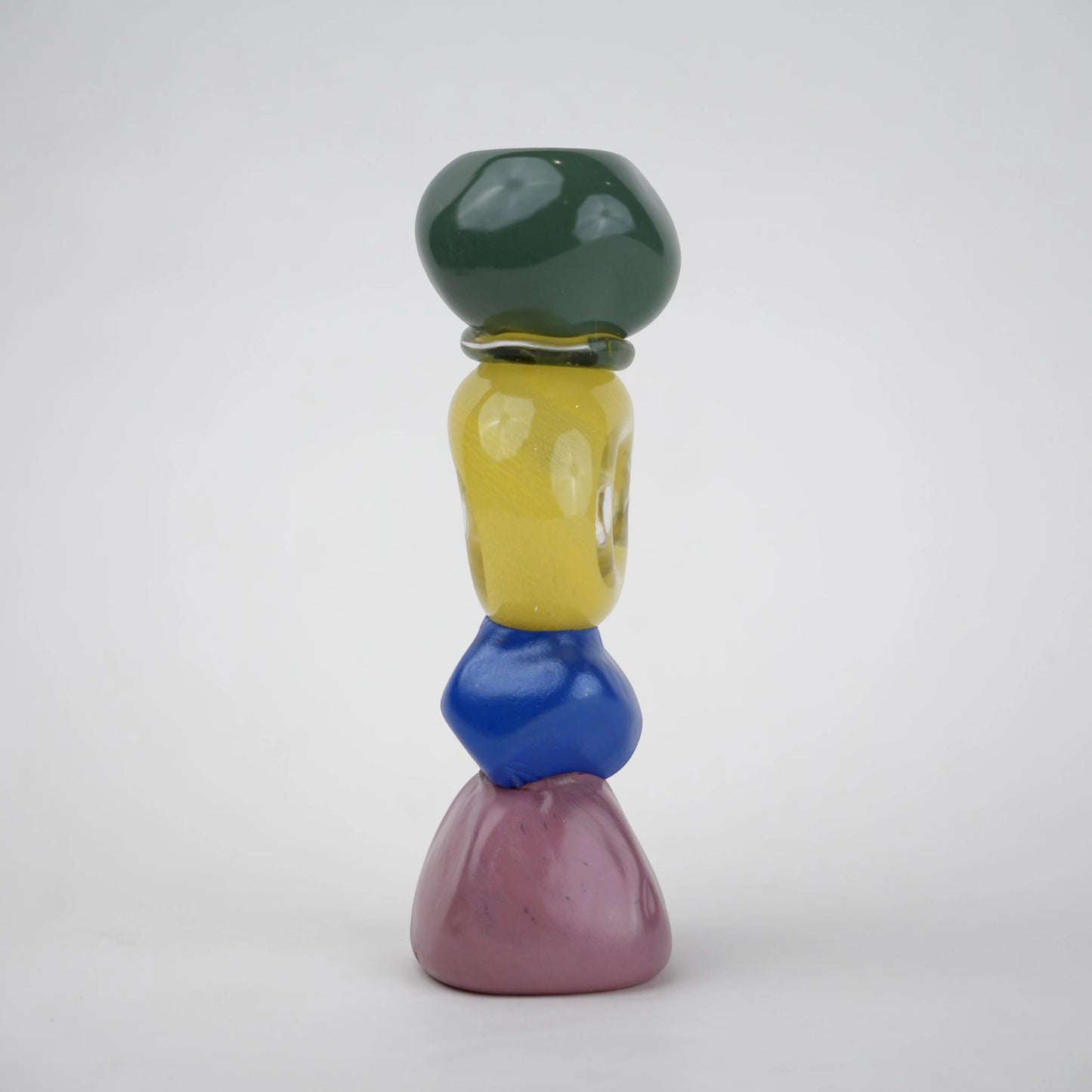 Colorful totem glass candle holder with stacked geometric design and circular ring center