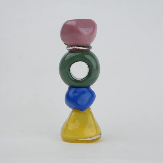Colorful totem glass candle holder with stacked geometric design and circular ring center