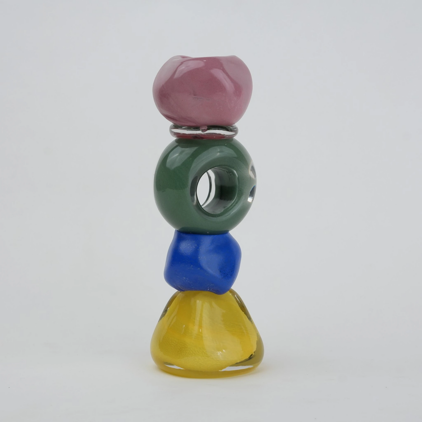 Colorful totem glass candle holder with stacked geometric design and circular ring center