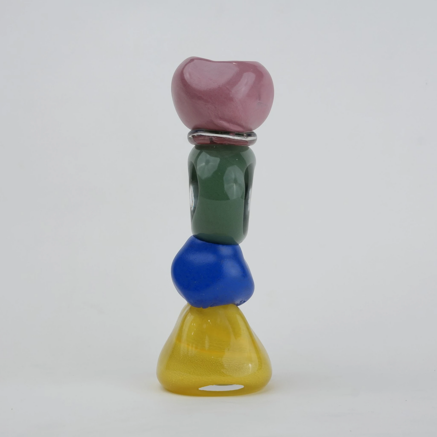 Colorful totem glass candle holder with stacked geometric design and circular ring center