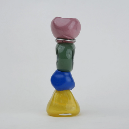 Colorful totem glass candle holder with stacked geometric design and circular ring center