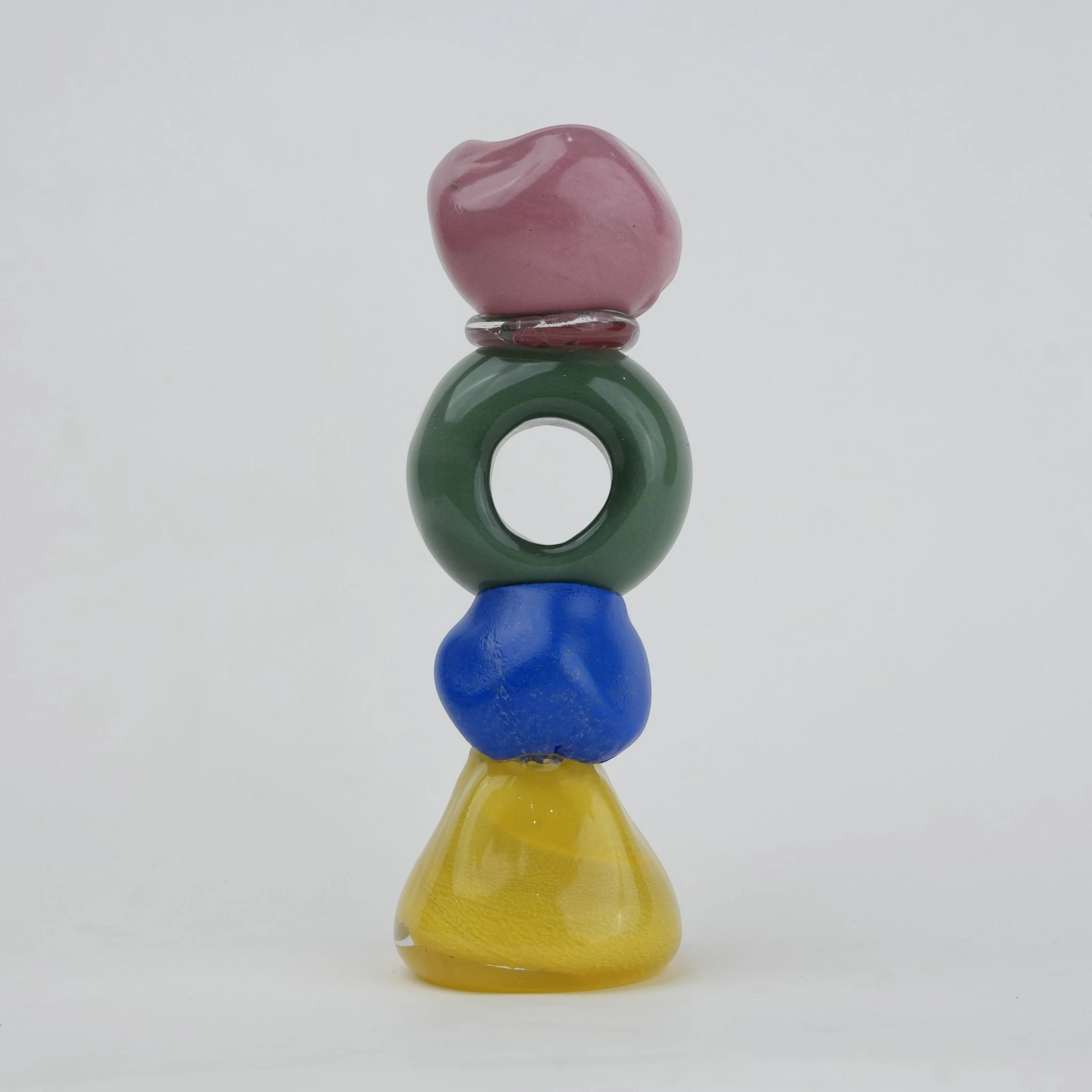 Colorful totem glass candle holder with stacked geometric design and circular ring center