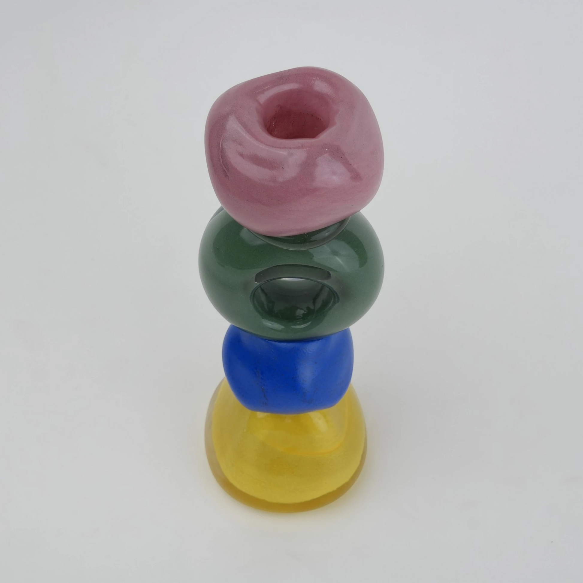Colorful totem glass candle holder with stacked geometric design and circular ring center