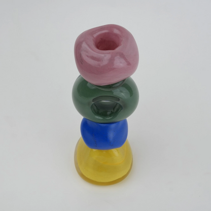Colorful totem glass candle holder with stacked geometric design and circular ring center