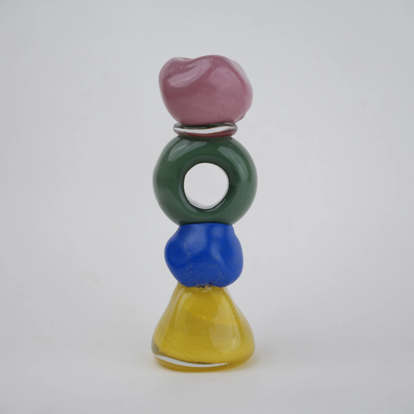 Colorful totem glass candle holder with stacked geometric design and circular ring center