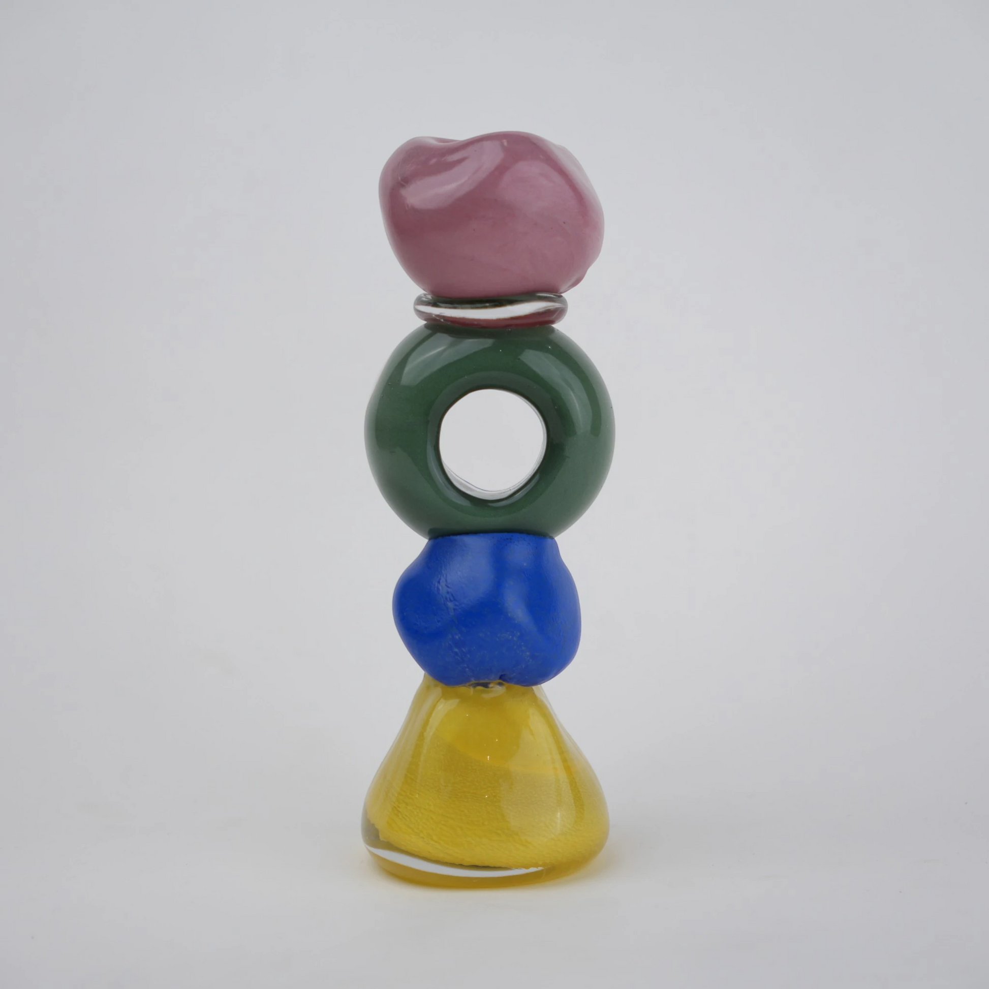 Colorful totem glass candle holder with stacked geometric design and circular ring center