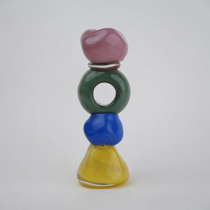 Colorful totem glass candle holder with stacked geometric design and circular ring center