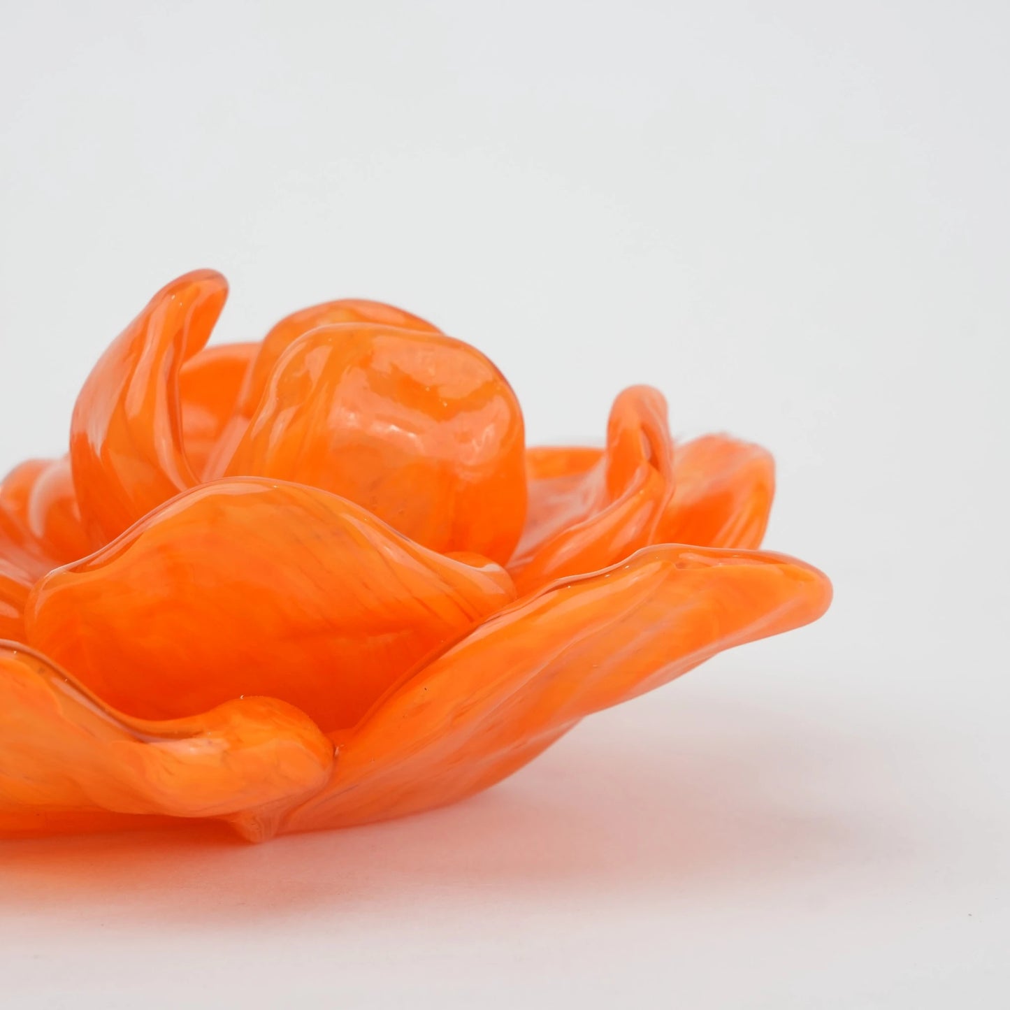 Handcrafted glass flower candle holder with layered petal design