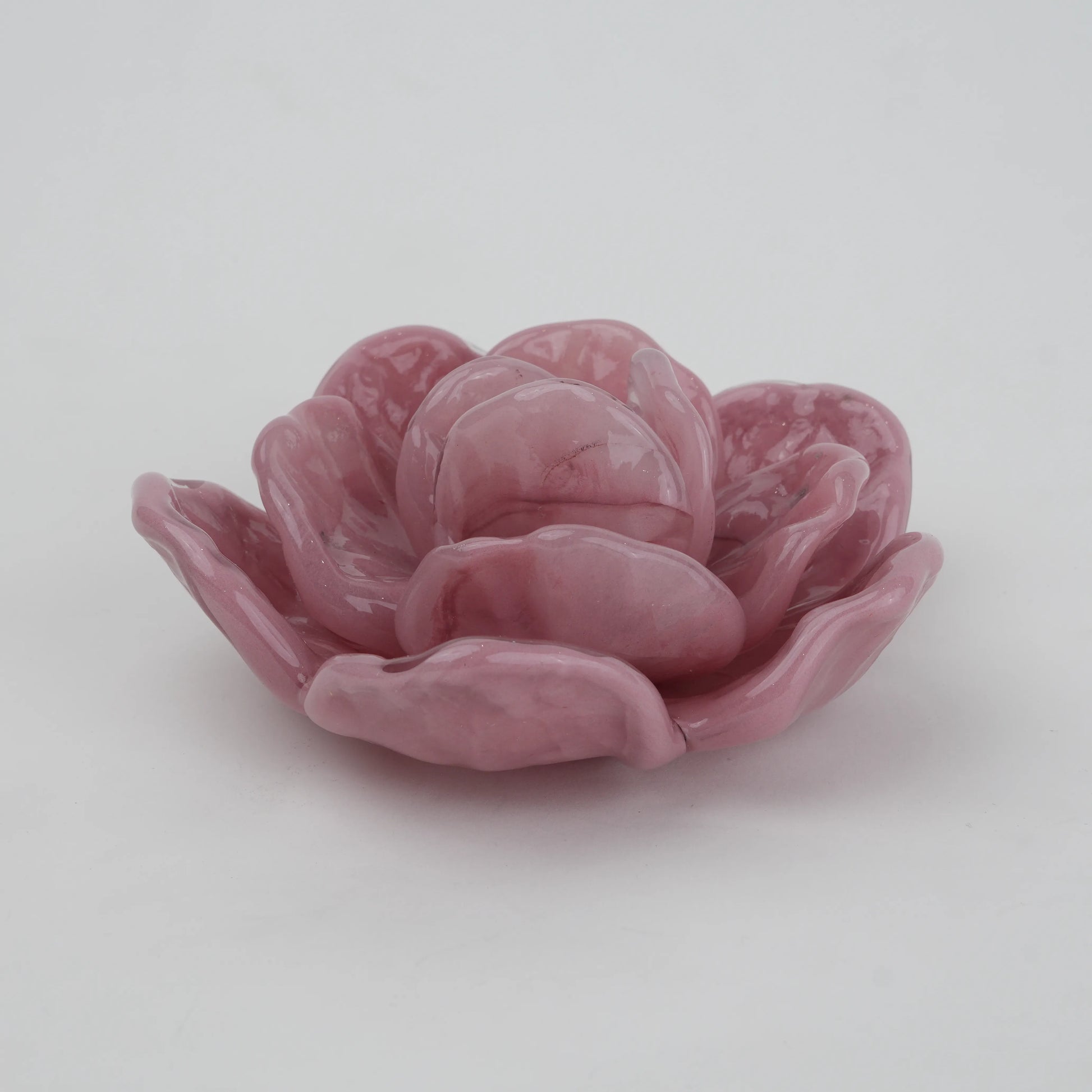 Handcrafted glass flower candle holder with layered petal design