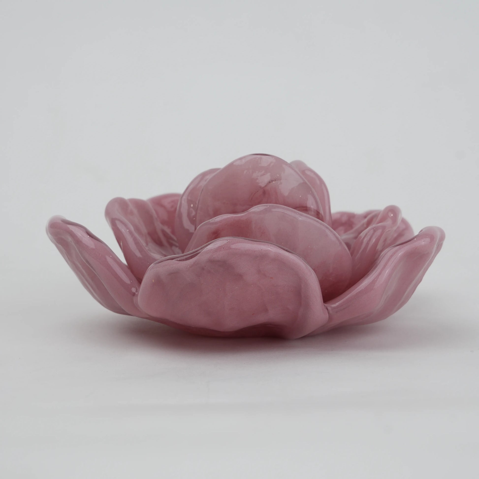 Handcrafted glass flower candle holder with layered petal design