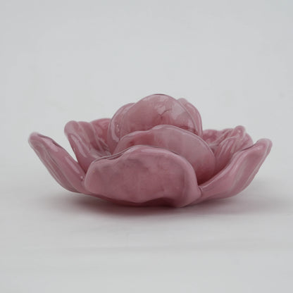 Handcrafted glass flower candle holder with layered petal design