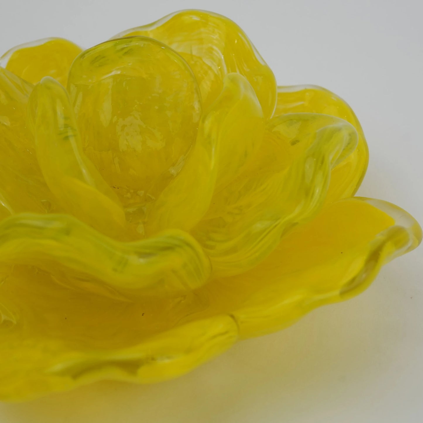 Handcrafted glass flower candle holder with layered petal design