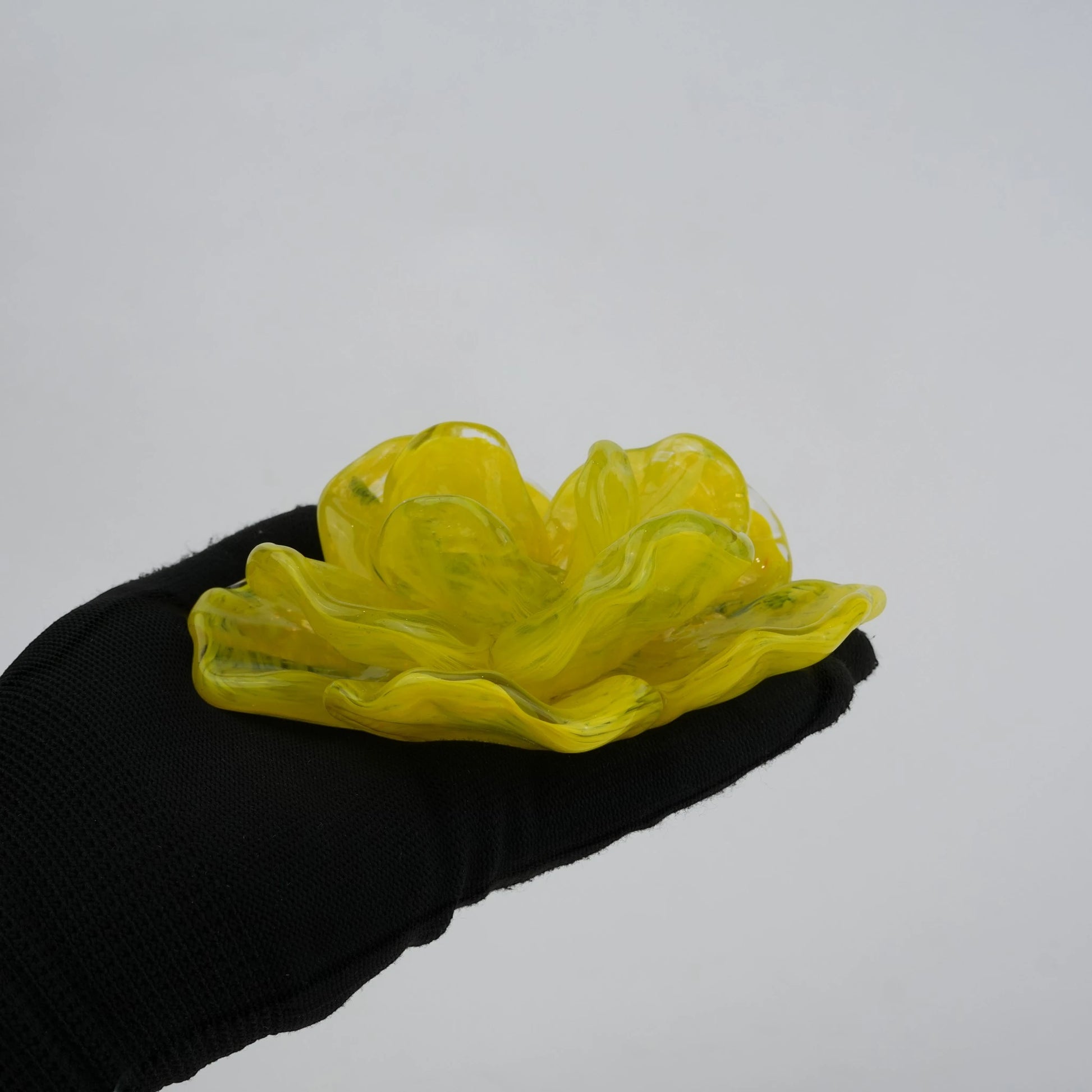 Handcrafted glass flower candle holder with layered petal design
