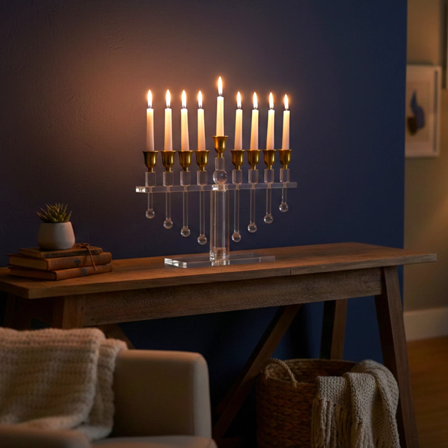 Crystal clear glass candle holder set with antique gold top cups arranged in a coordinated display