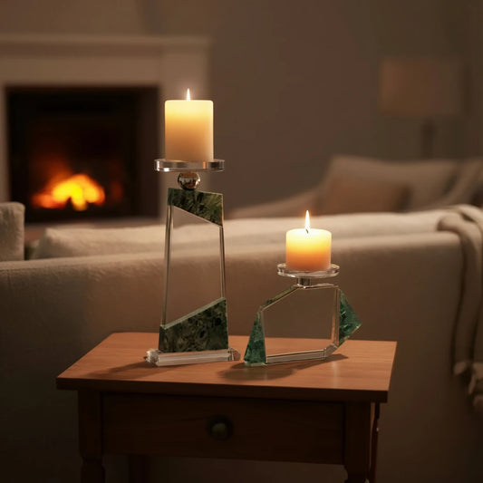 Clear geometric glass candle holder with aqua tinted base and circular design detail