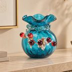 Aqua Bloom turquoise vase, red berry close-up