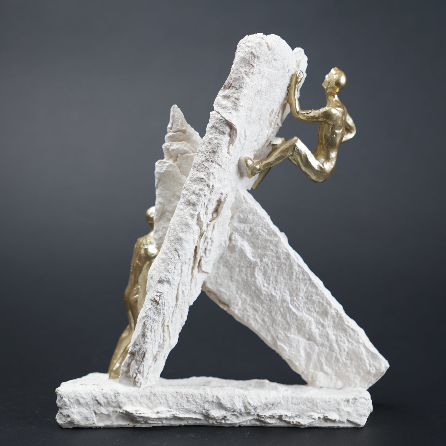 textured decor figurine with gold figures modern home styling