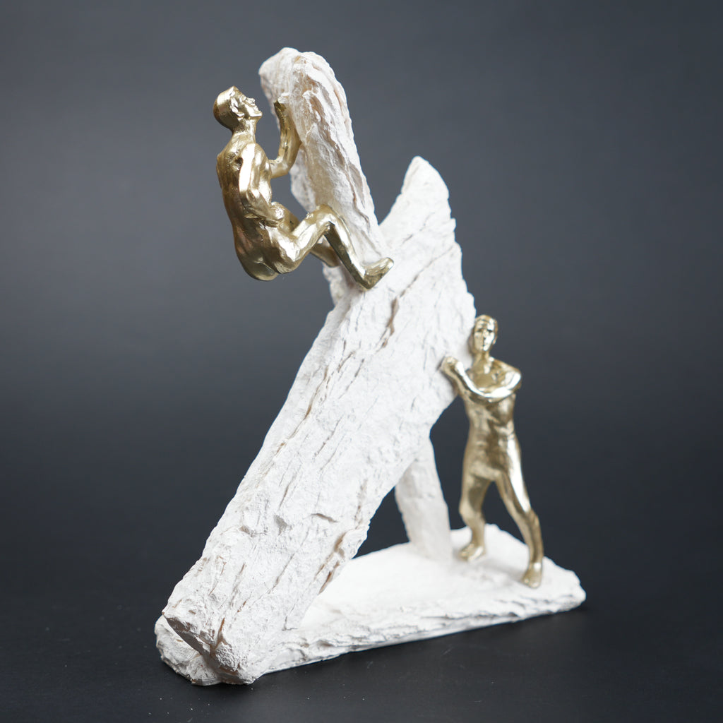 textured decor figurine with gold figures modern home styling