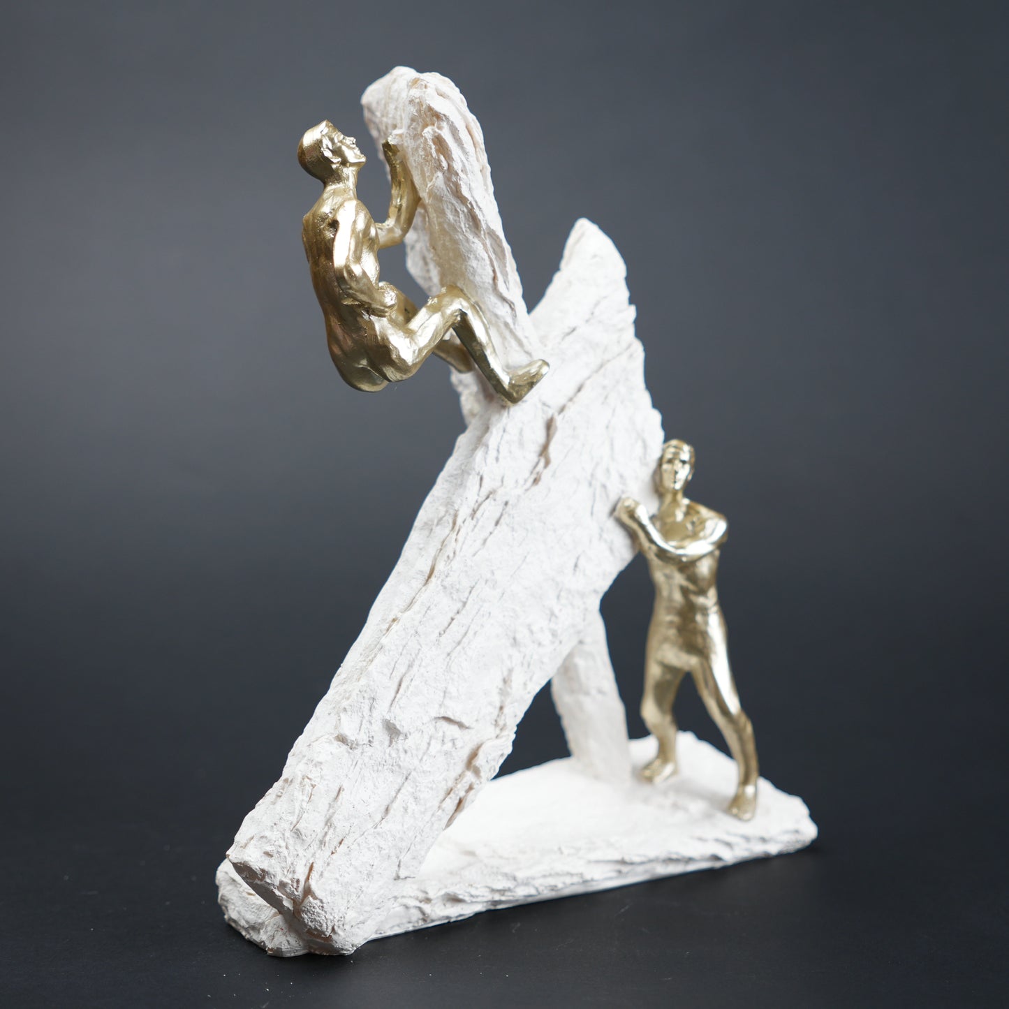 textured decor figurine with gold figures modern home styling