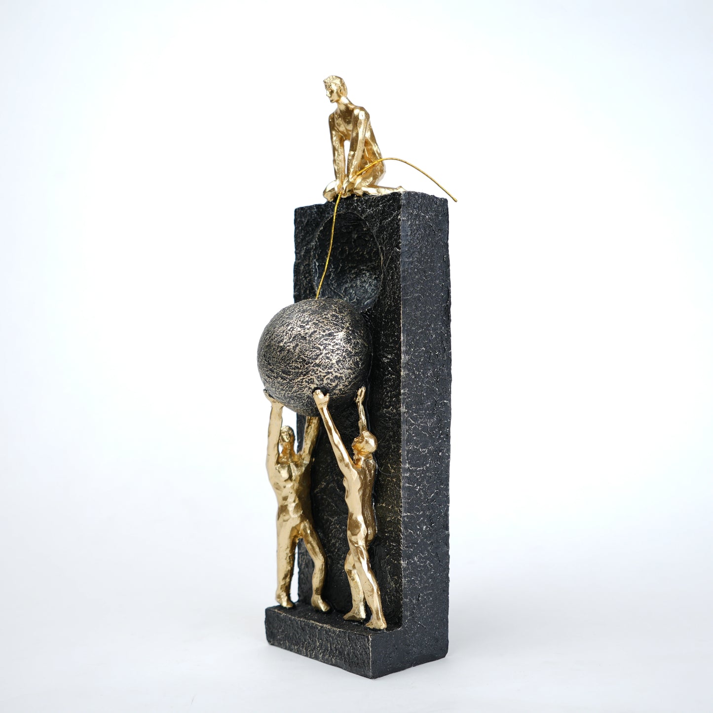 Teamwork figurine sculpture lifting sphere on textured stone base in black and white variants